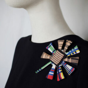 Textile brooch by Isabelle Mariana.