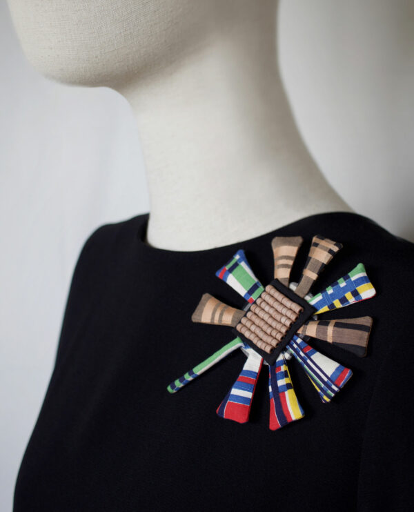 Textile brooch by Isabelle Mariana.