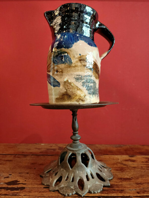 Picture showing a glazed earthenware pitcher