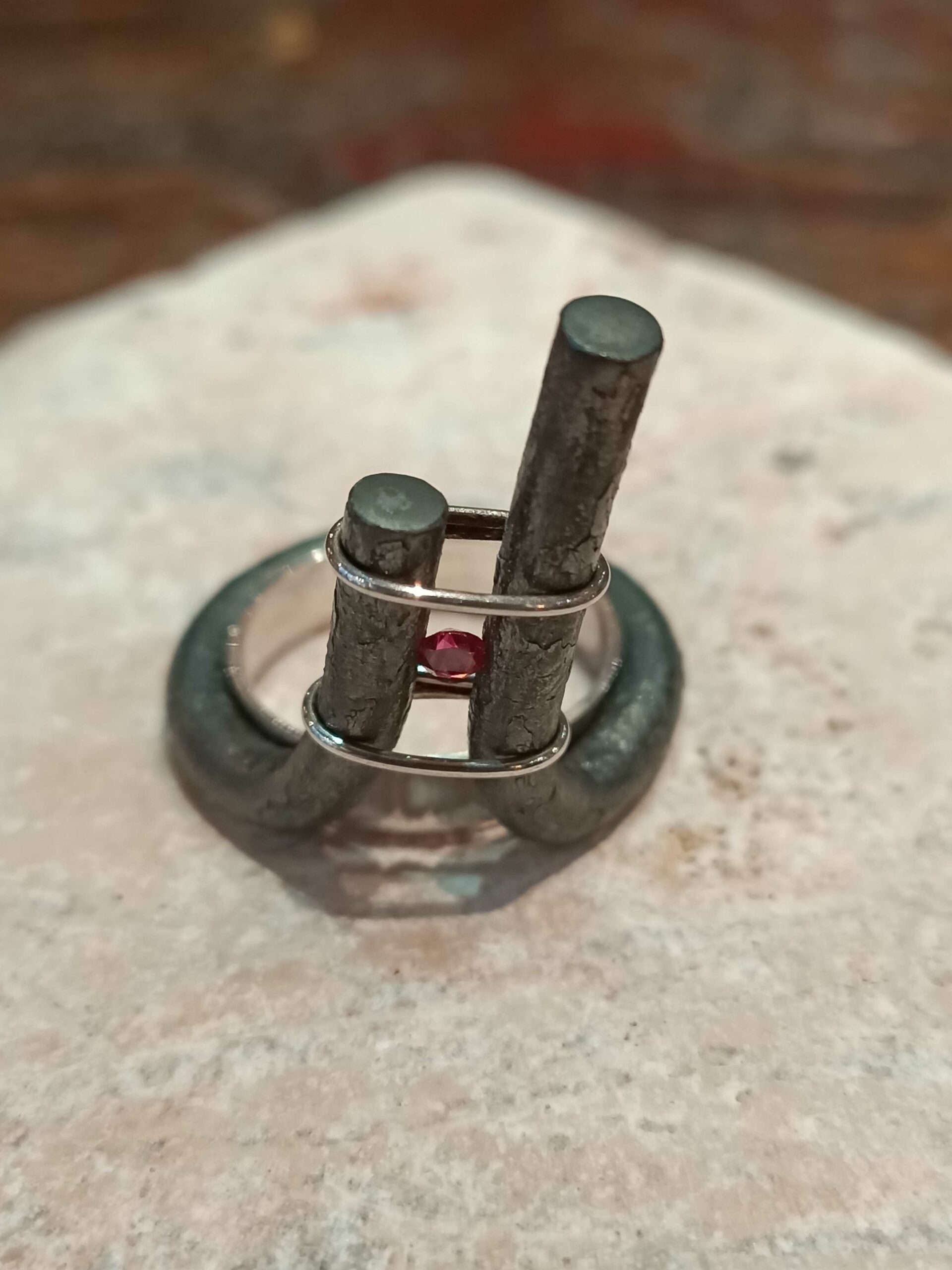 Wrought iron, silver and spinel ring by Marianne Anselin