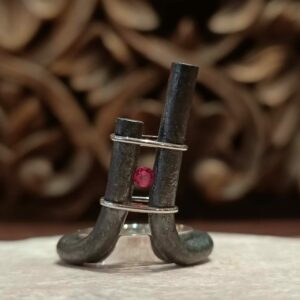 Wrought iron silver and pink stone ring.