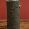 Enamelled black stoneware and brass vase by Meig.