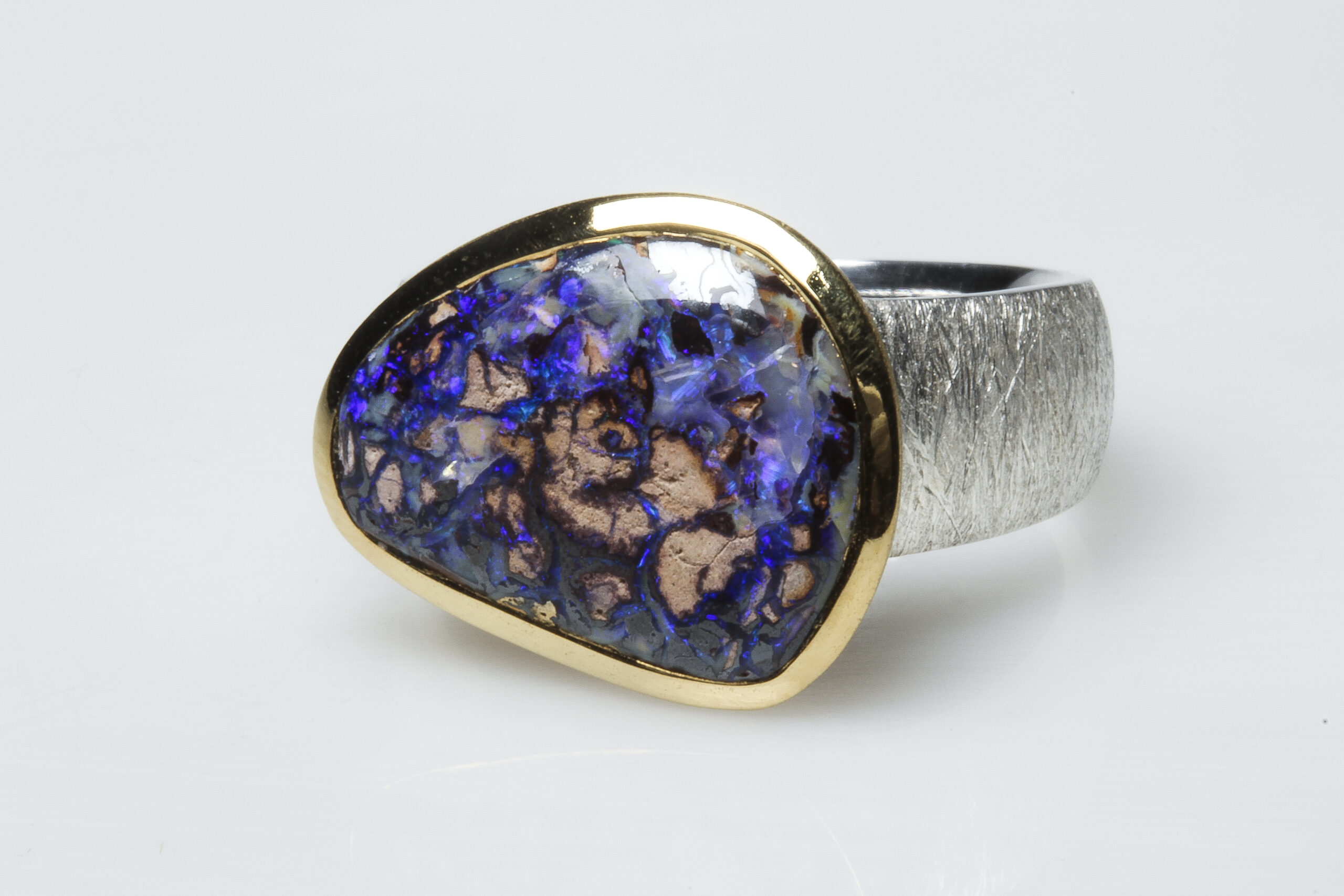 Boulder opal, silver and vermeil ring Boulder opal, silver and vermeil ring.