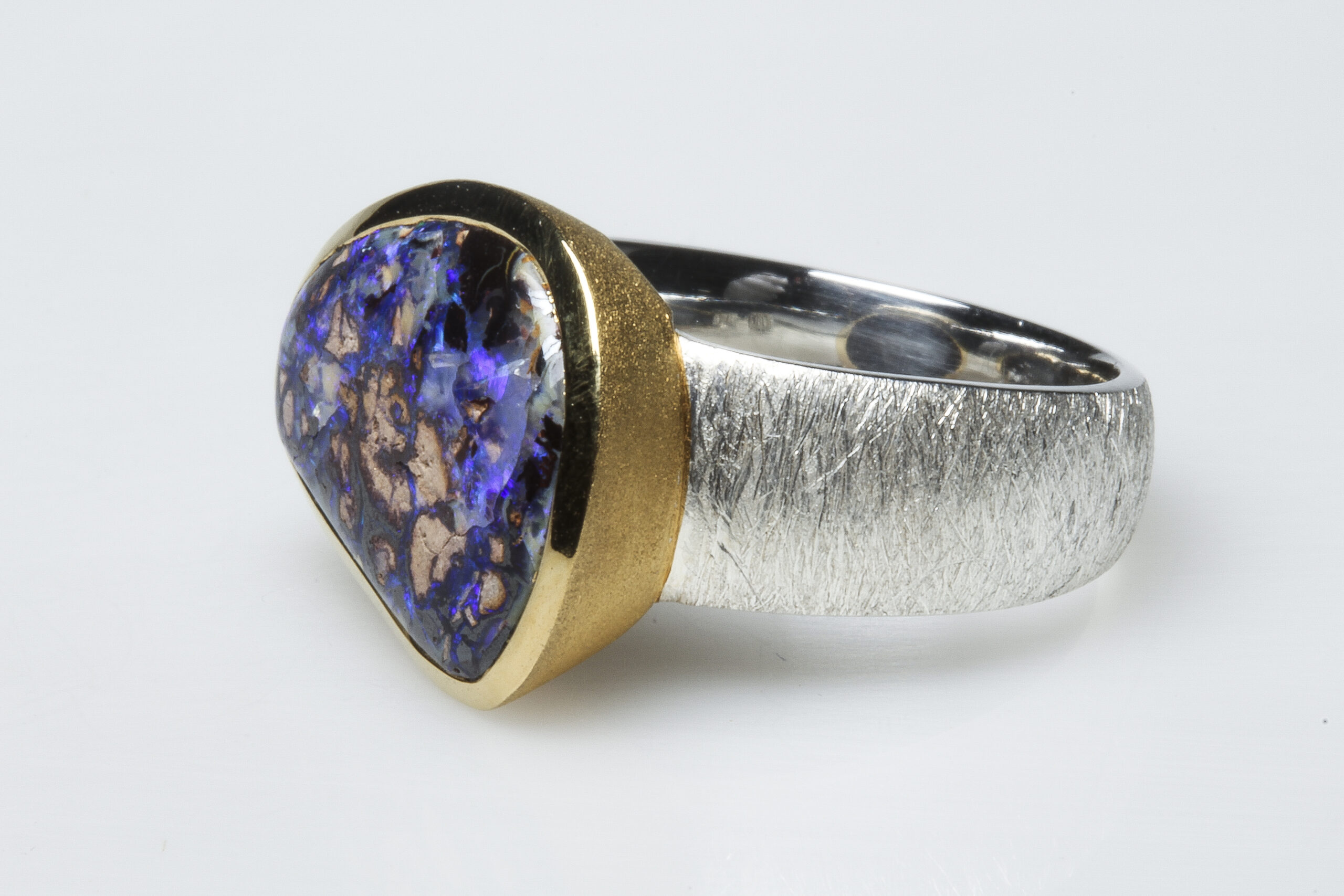 Boulder opal, silver and vermeil ring Boulder opal, silver and vermeil ring.