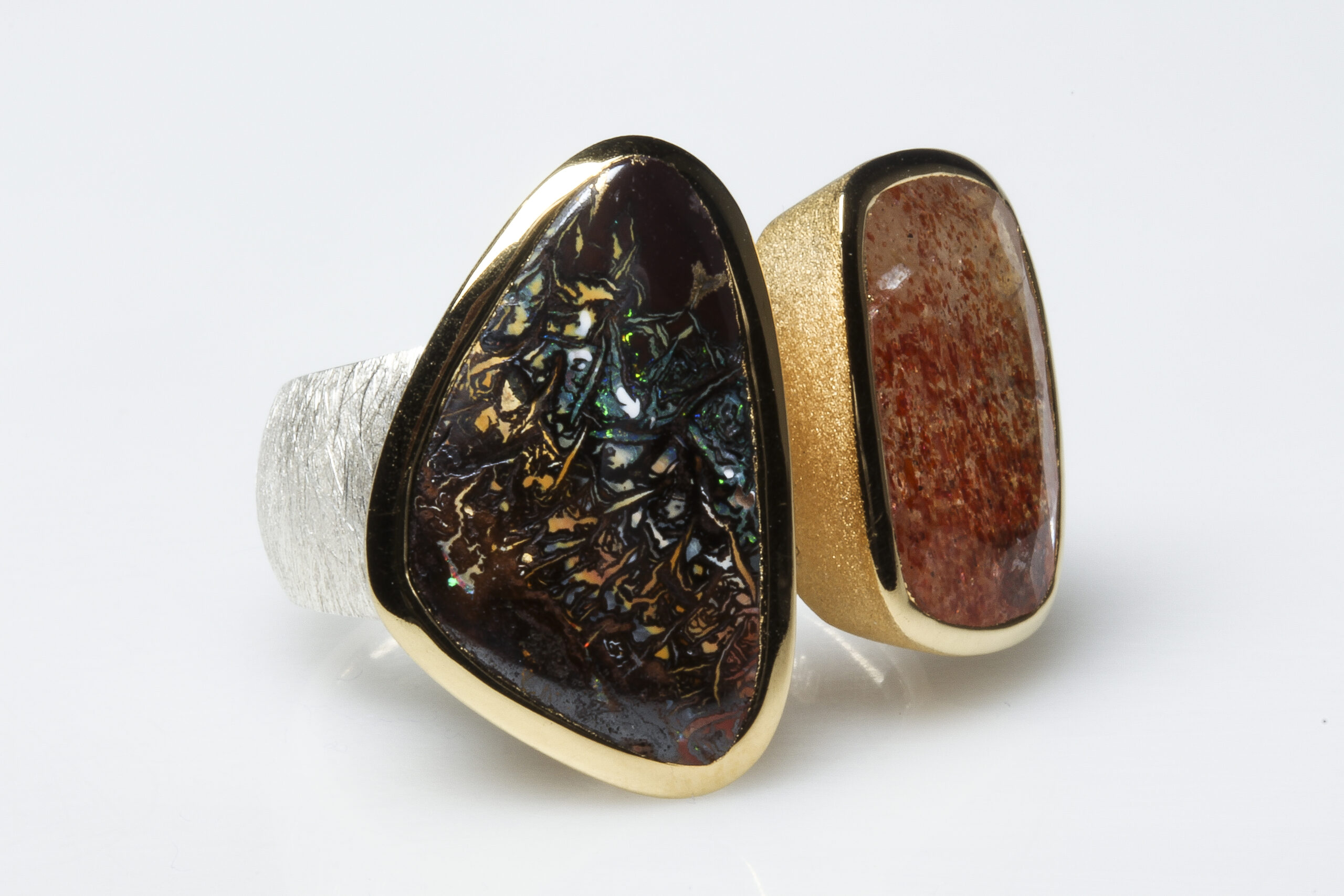 Boulder opal, sunstone, silver and vermeil ring. Boulder opal, sunstone, brushed silver and mat vermeil ring.