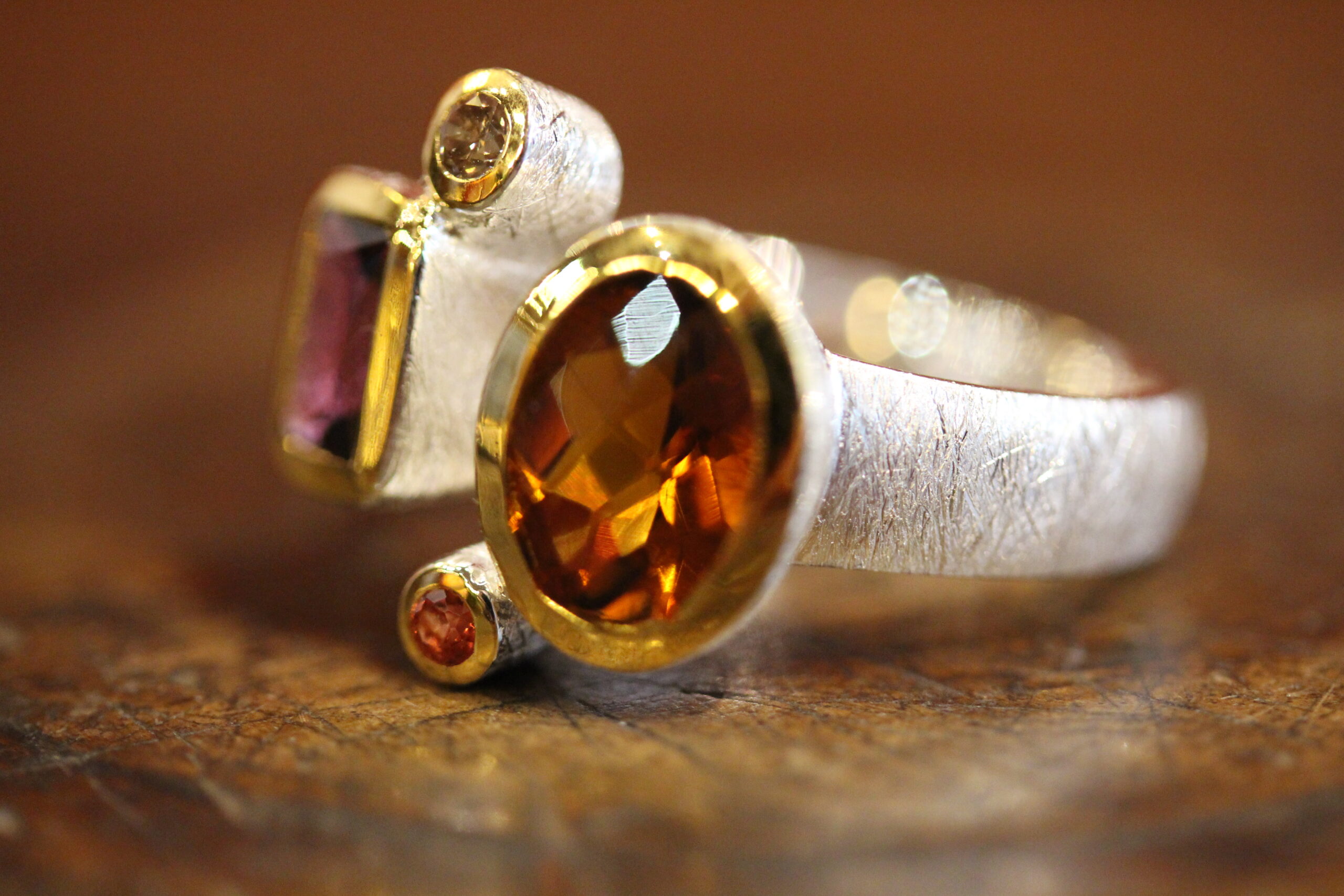 Silver, vermeil, citrin, rhodolite,sapphire and diamond ring. Silver, vermeil, citrin, rhodolite,sapphire and diamond ring.