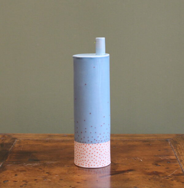 Enamelled blue and white porcelain sprinkled with red dots.
