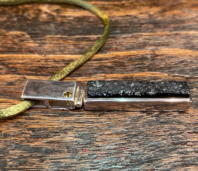 Black tectite, citrin and silver pendant.