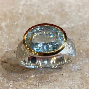 Brushed silver, vermeil and aquamarine ring.