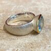 Brushed silver, vermeil and aquamarine ring.