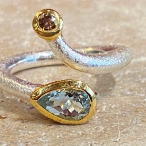 Brushed silver, vermeil, aquamarine and diamond ring.