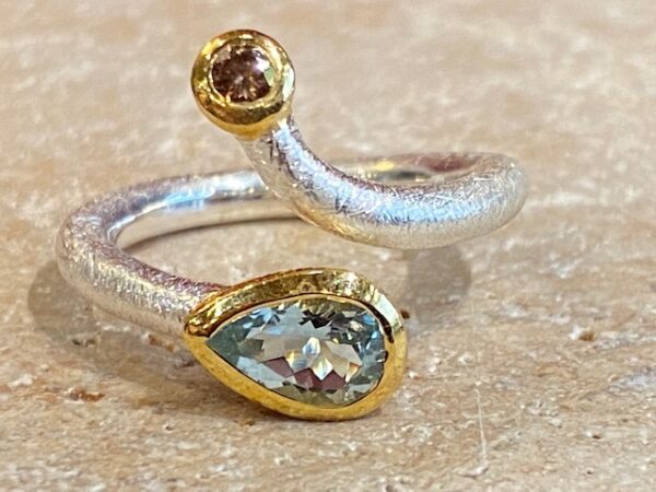 Brushed silver, vermeil, aquamarine and diamond ring.