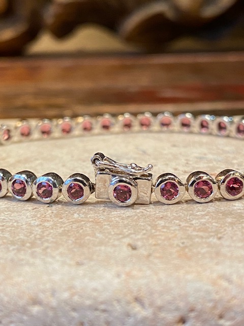 Silver and rhodolite bracelet Silver and rhodolite bracelet.
