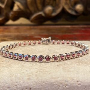 Silver and rhodolite bracelet.