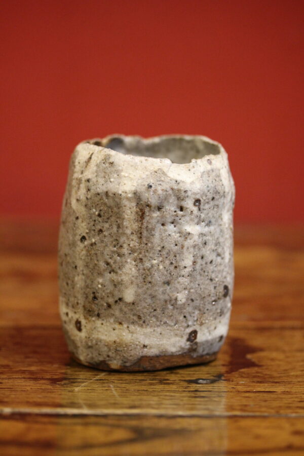 Enamelled stoneware cup.