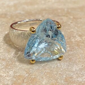 Brushed silver, vermeil and topaz ring.