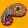 Textile brooch by Isabelle Mariana.